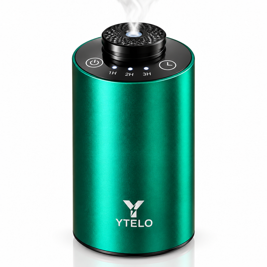YTELO Emerald Green waterless essential oil diffuser with metallic finish, black control panel, and fine mist on a clean white studio background.